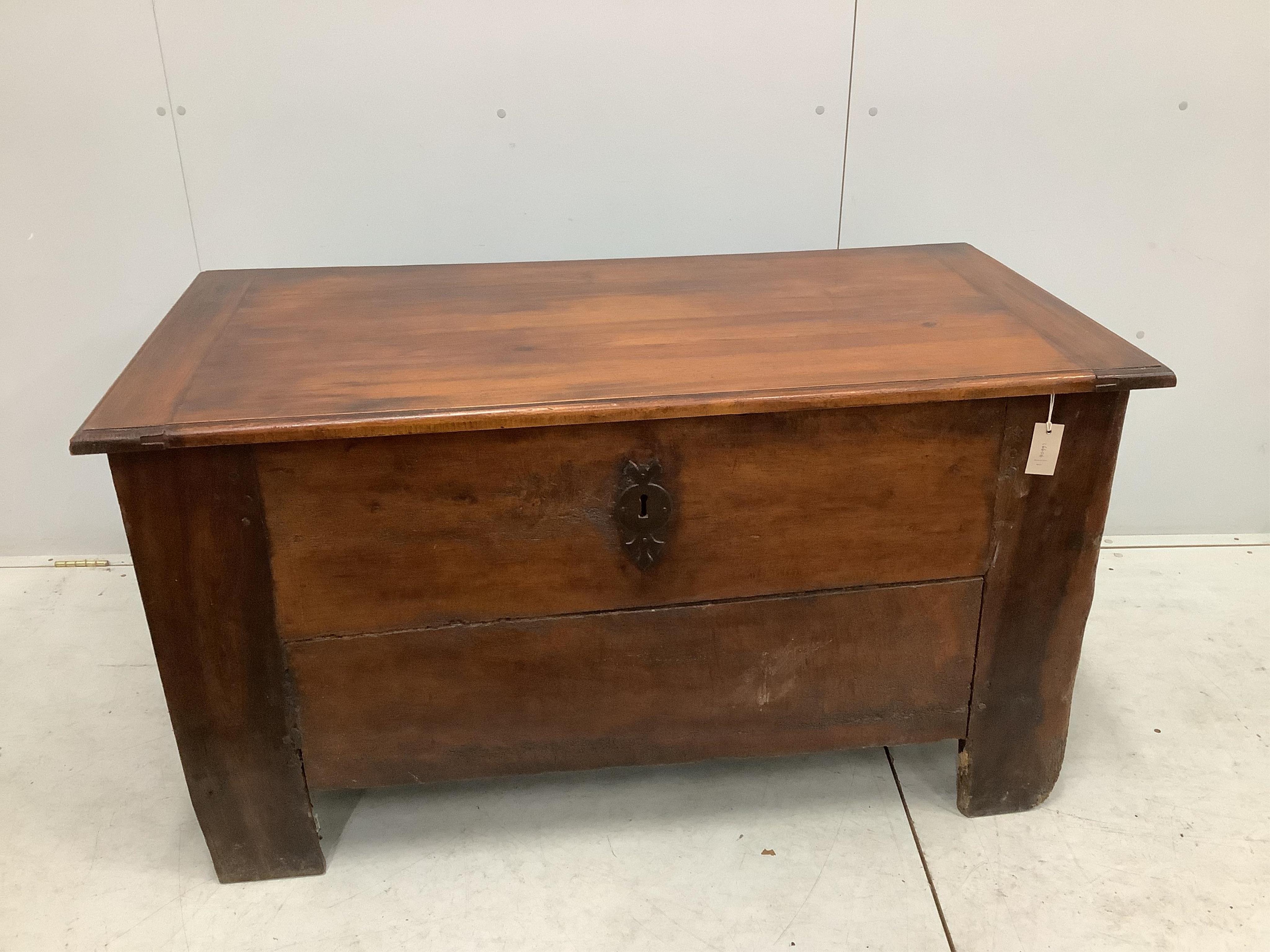 An 18th century and later French oak and fruit wood coffer, width 129cm, depth 65cm, height 71cm. Condition - fair, with later top